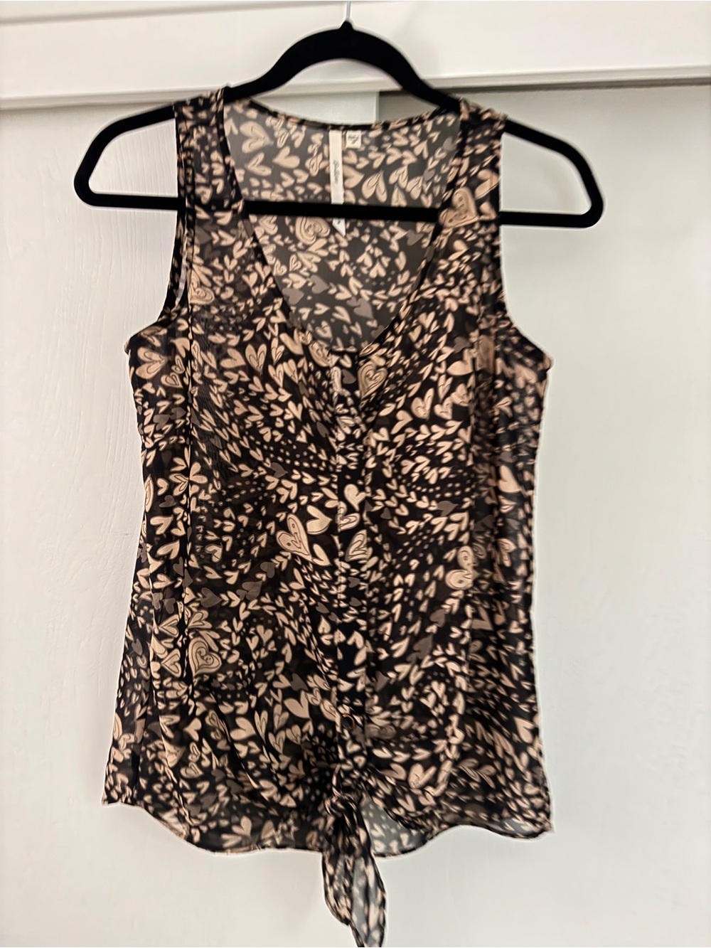 Bellatrix Black Sheer Sleeveless Top with Pink Heart-Shaped Print